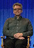 Jeffrey Bell sitting.